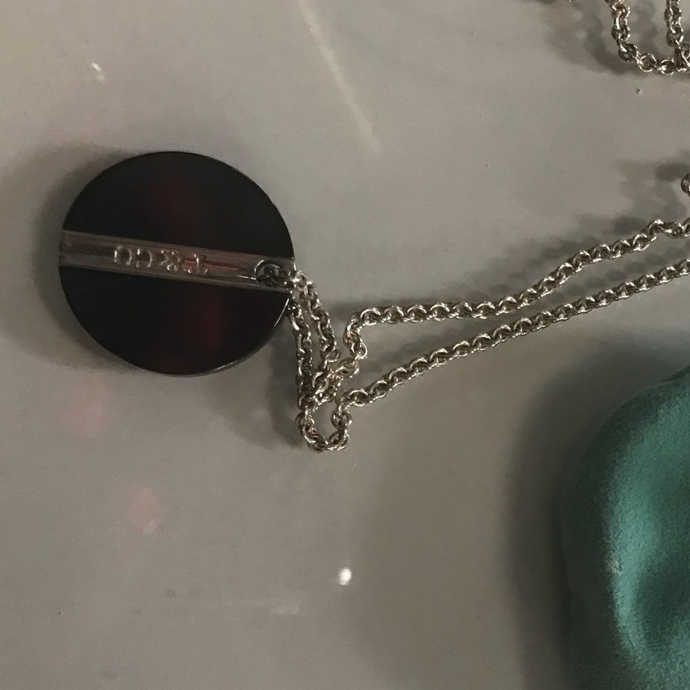 Tiffany and Co. onyx and sterling disc pendant
